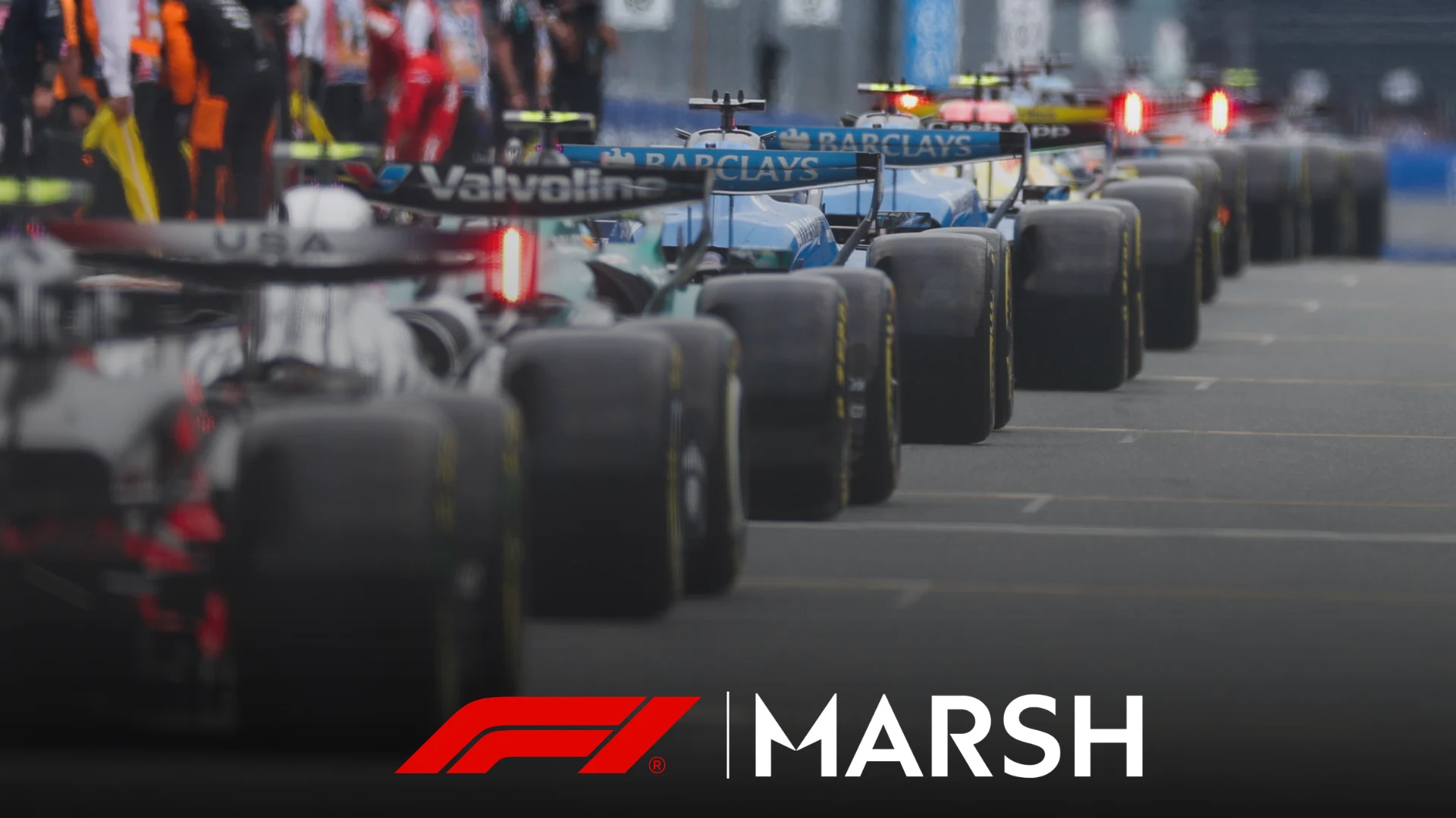 F1 engineers and strategists assessing data and risk management
