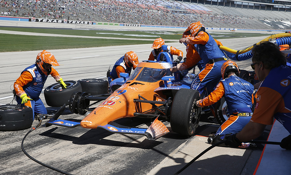 Pit crews execute rapid service during the Pit Stop Challenge