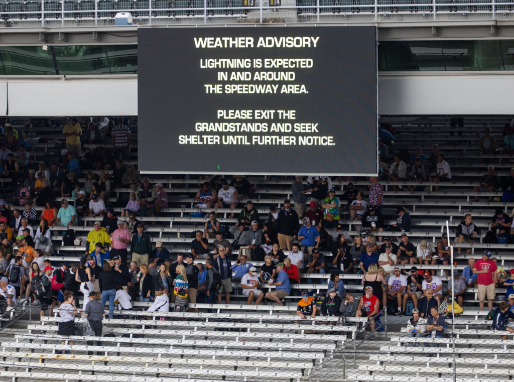 Fans evacuate grandstands as severe weather delays the Indy 500