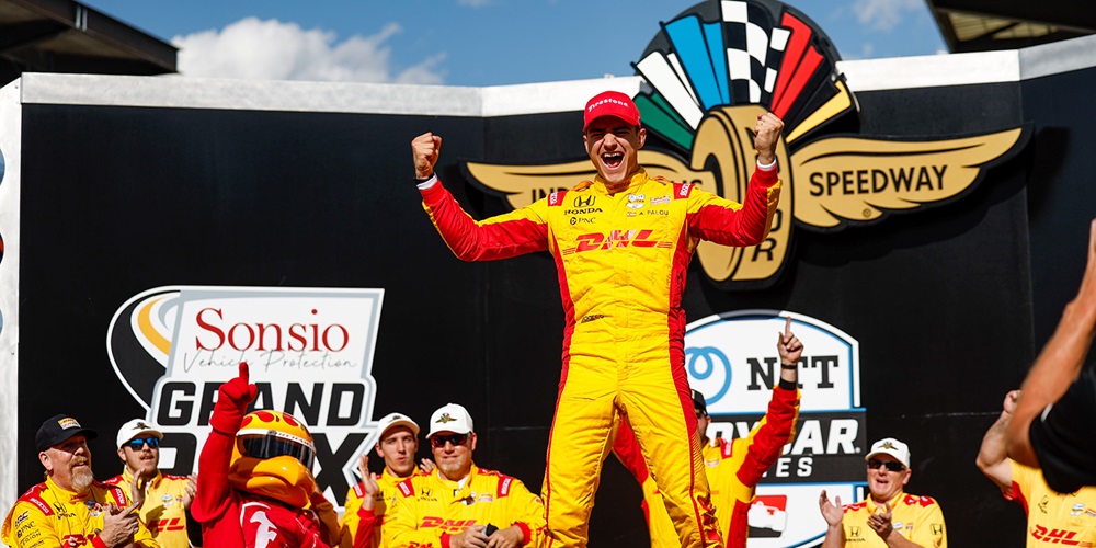 Alex Palou celebrates a Sonsio Grand Prix victory at the IMS road course