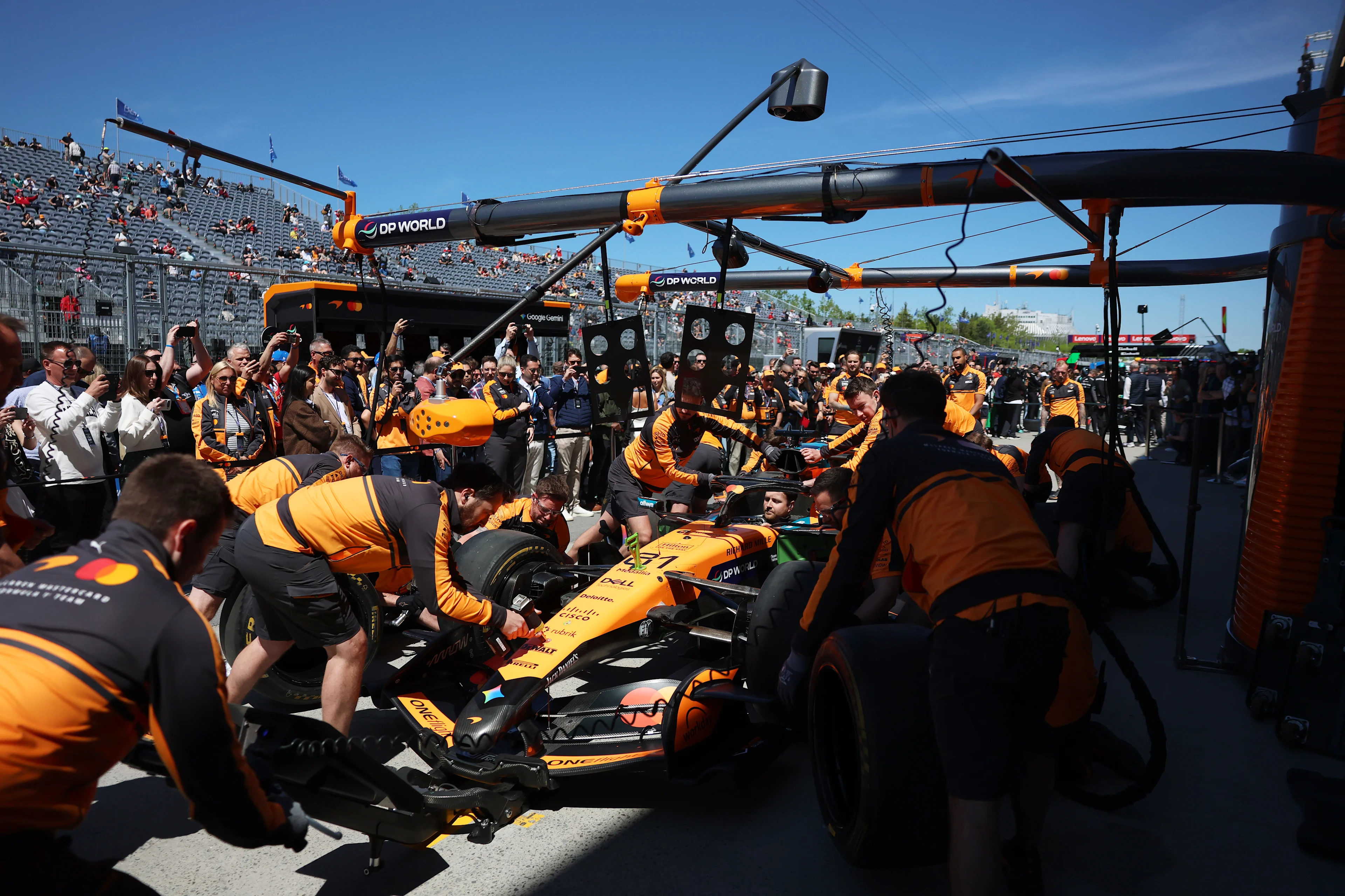 McLaren Reveals Game-Changing Intermediate Tyre Strategy in Canada 3 McLaren crew at work during the Canadian Grand Prix weekend