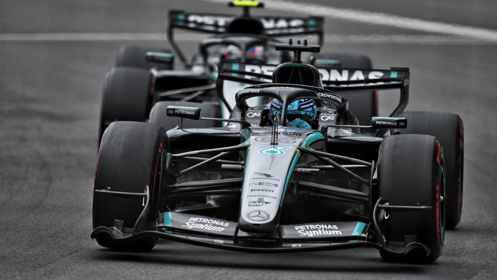 Mercedes Unveils Shocking Reason Behind Russell’s Canada DNF 2 Mercedes engineers examine George Russell’s car after power unit failure in Montreal