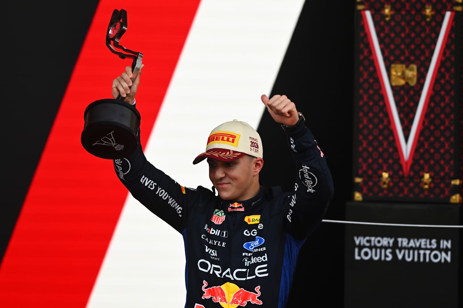 How Hadjar Saved the Car to Secure a Thrilling P3 Finish 2 Isack Hadjar celebrates a Monaco podium for Red Bull