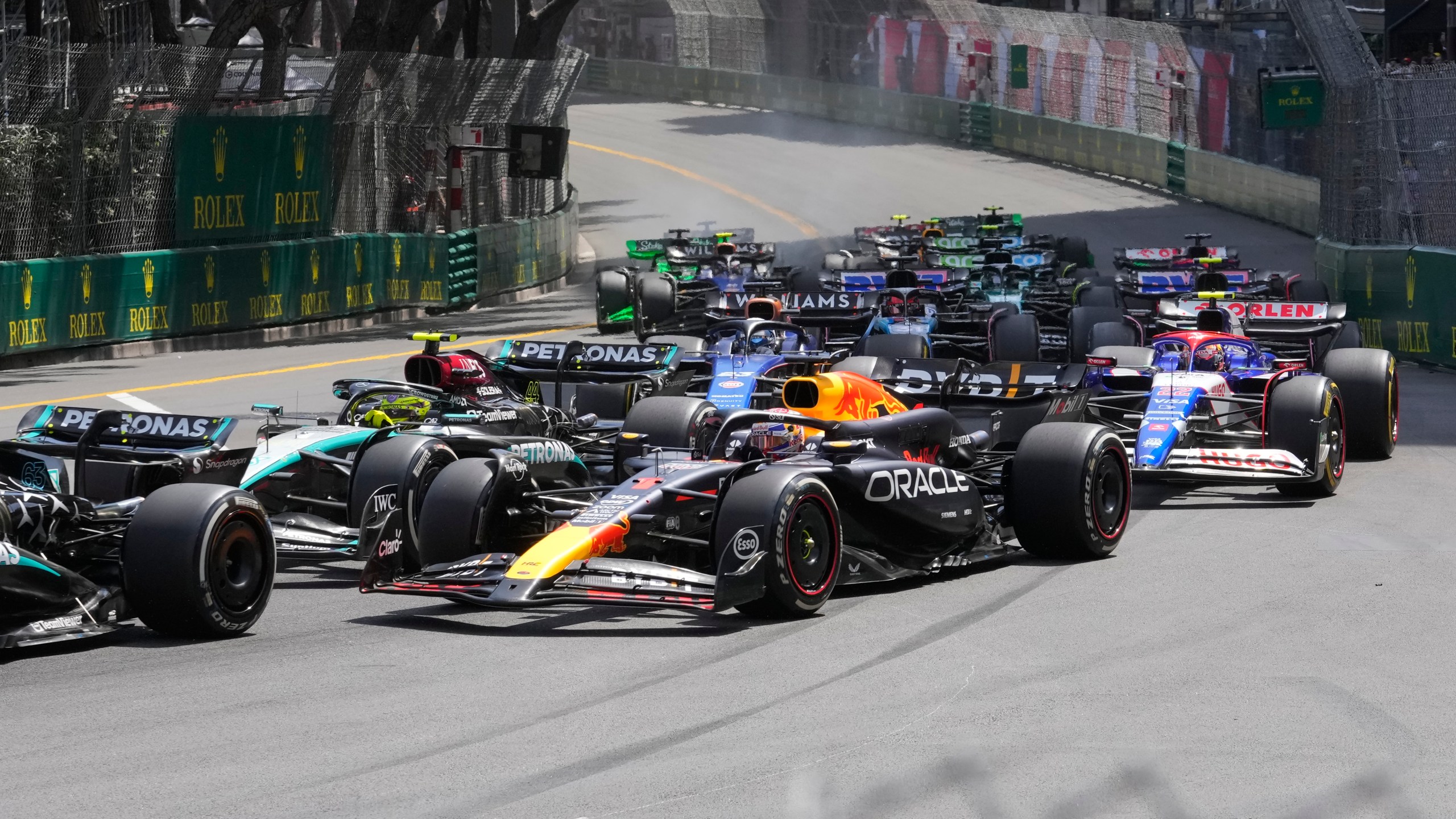 F1 Driver Crashes Dramatically Seconds After First Grand Prix Victory 2 F1 car navigating wet conditions amid heavy spray