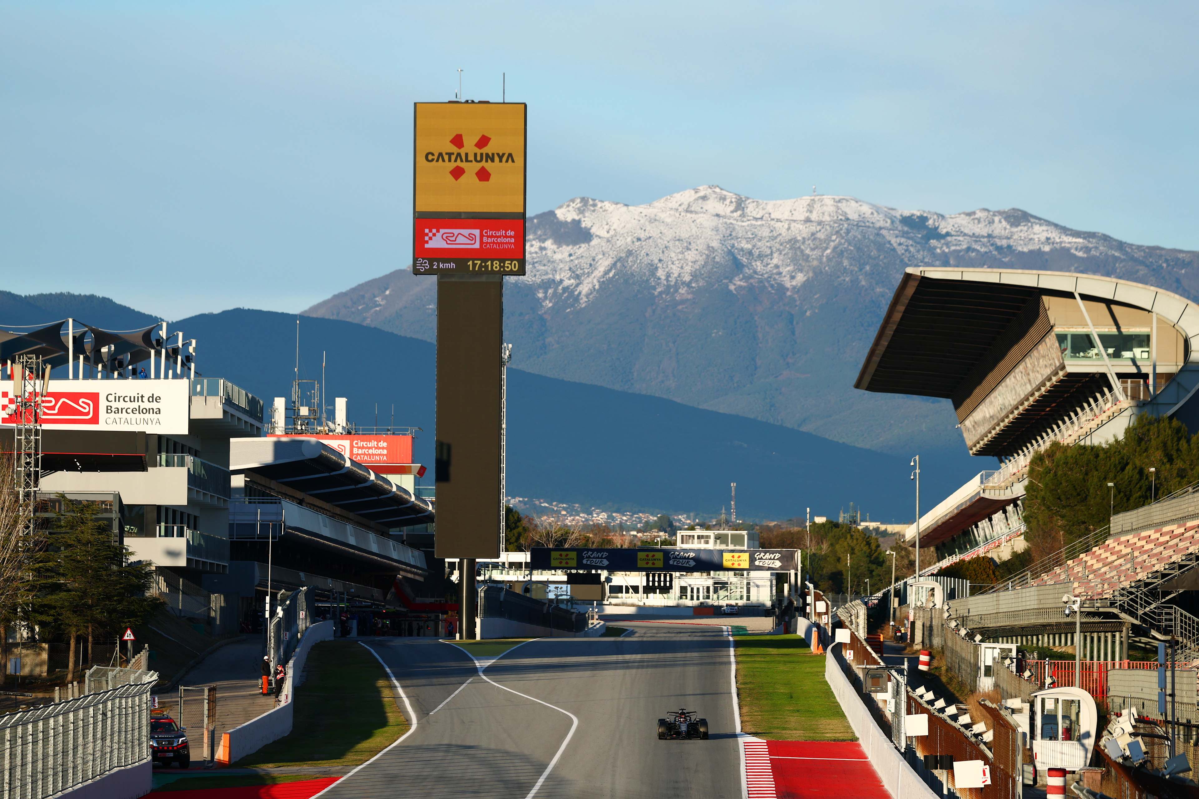 Barcelona-Catalunya Grand Prix Betting Guide: Top Odds & Tips 3 F1 cars navigating Barcelona-Catalunya during practice runs