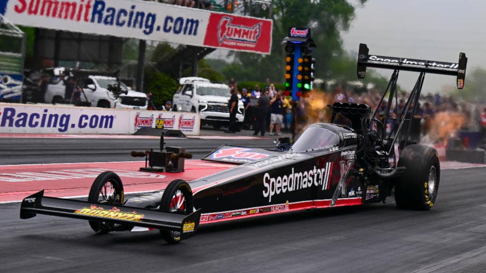 John Force Racing Drivers Deliver Top Qualifying Runs in Norwalk 3 Alexis DeJoria and crew dial in the Funny Car during Norwalk qualifying