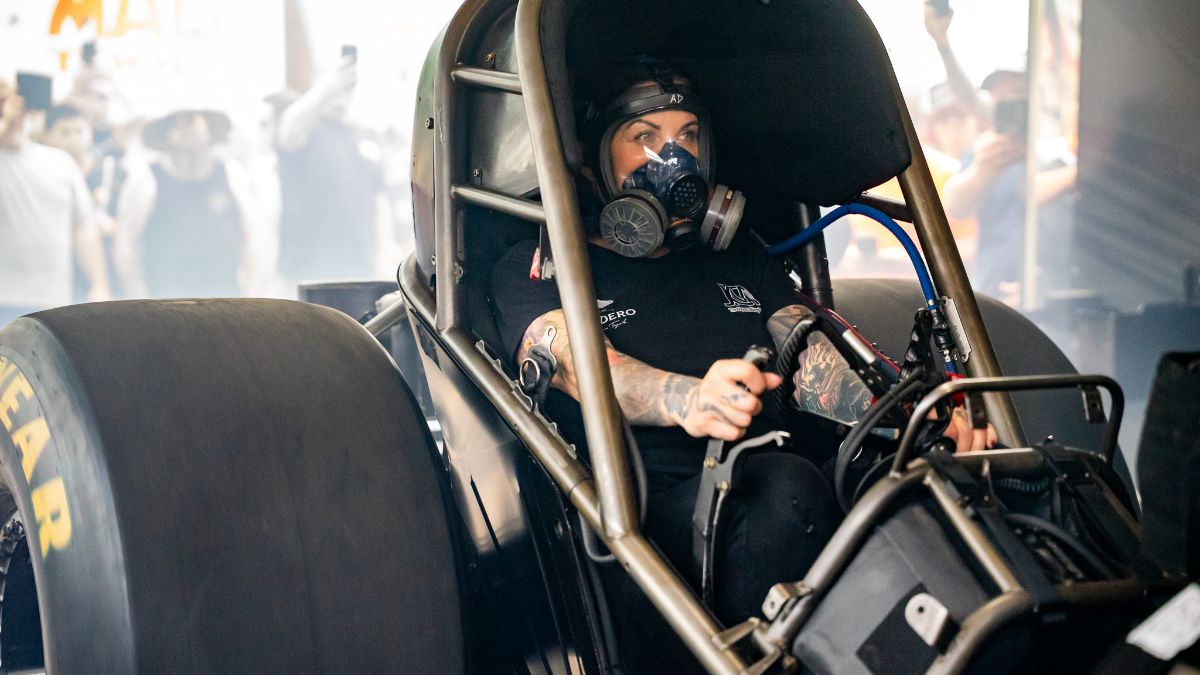 Alexis DeJoria Exits Epping Boosted With New Confidence 2 Bandero Café Funny Car prepares in the pits during NHRA weekend