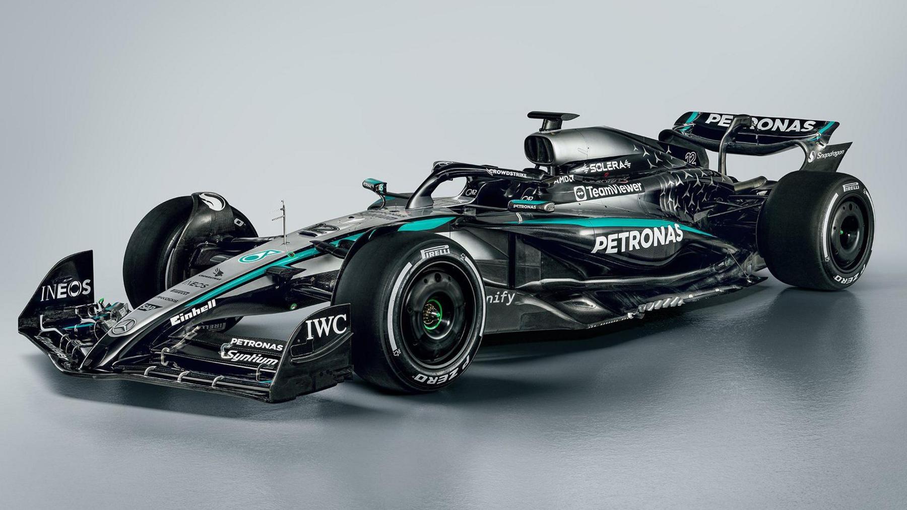 George Russell Says Overtakes Are Crucial to Securing Mercedes F1 Future 3 George Russell with a Mercedes F1 car at a team launch event