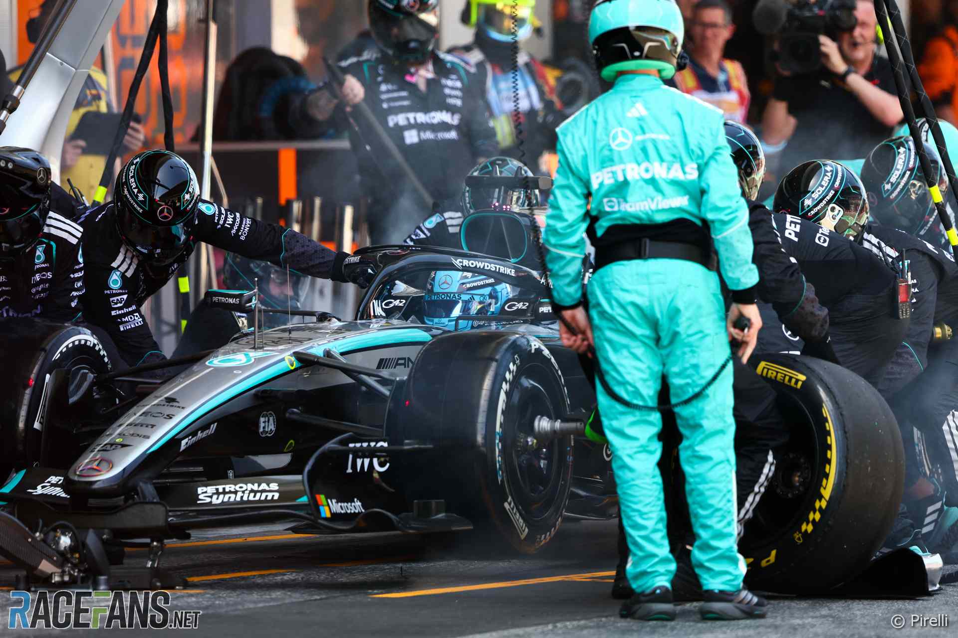 George Russell Says Overtakes Are Crucial to Securing Mercedes F1 Future 2 George Russell in the Mercedes garage during strategy discussions