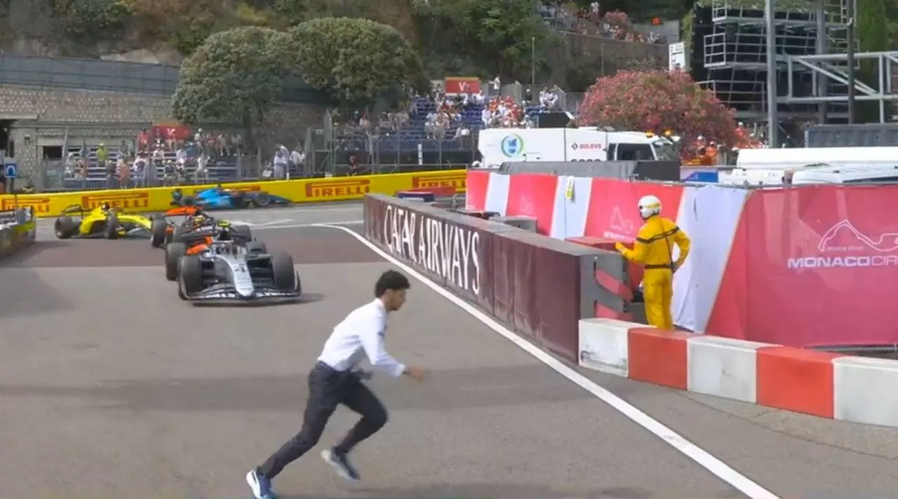 Shocking Pit Lane Near-Miss as Staff Runs Across During F2 Race 3 Car narrowly misses an event official near the pit lane