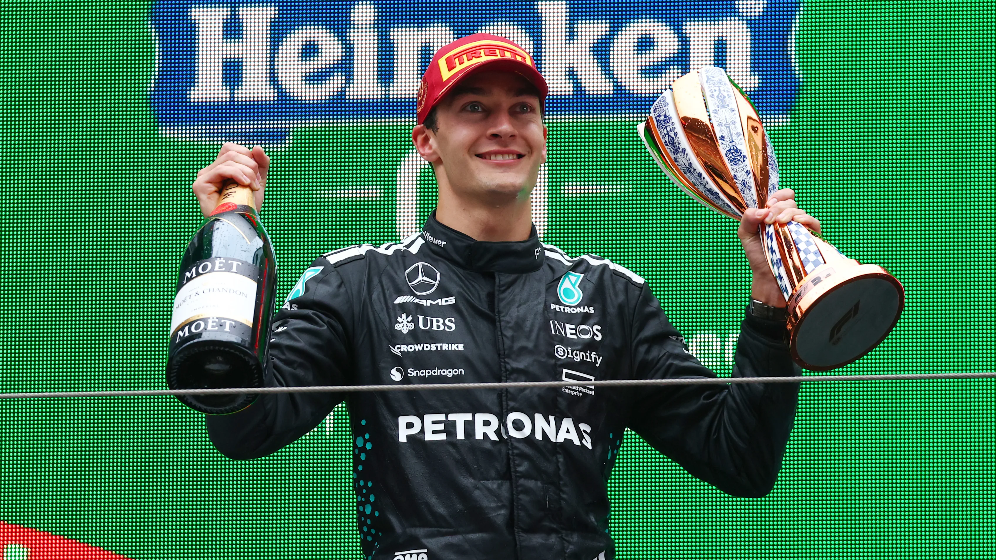 George Russell Credits Silverstone 'Luck' for Saving His Podium Spot 2 George Russell celebrates his Silverstone podium after a safety car finish