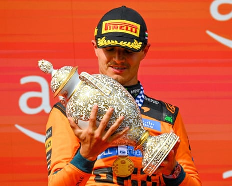 How Six Intense Laps and Wind Shifts Led Norris to Victory in Hungary 3 Lando Norris celebrates victory at the Hungaroring