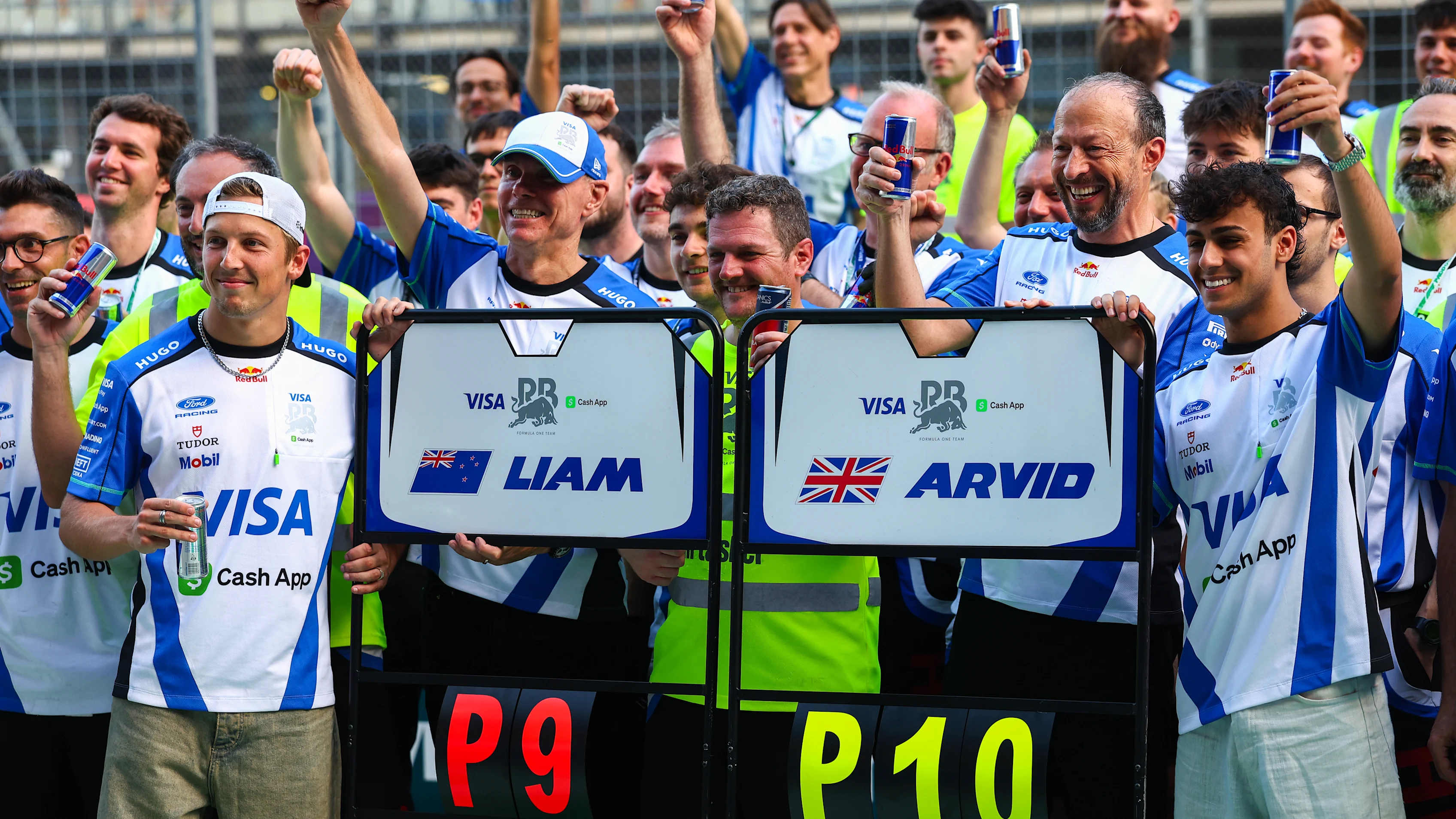 Liam Lawson Named ‘Perfect Benchmark’ in Key Arvid Lindblad Growth 3 Liam Lawson and Arvid Lindblad on track during the 2026 season