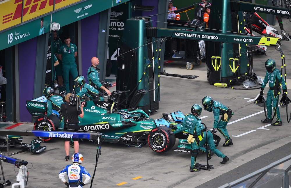 Honda Shares Aston Martin's First Reaction to F1 Struggles: 'No Complaints' 3 Aston Martin mechanics work on the AMR car amid vibration fixes
