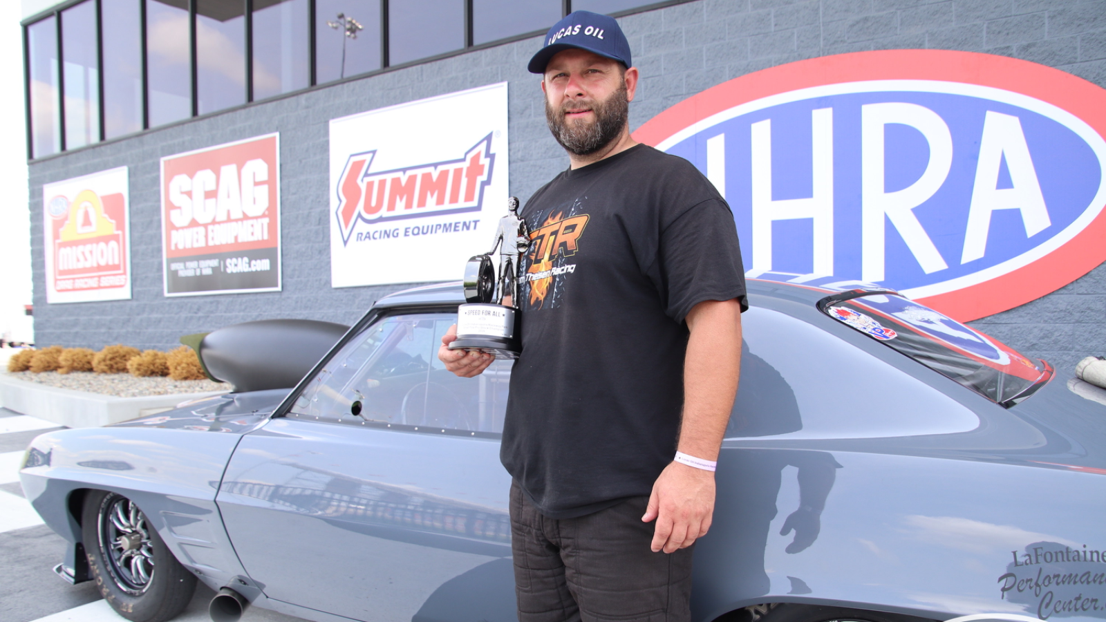 David Theisen Claims Thrilling Small Tire Pro Stock Indy Win and NHRA Wally 3 David Theisen celebrates Small Tire Pro Stock win at Indianapolis