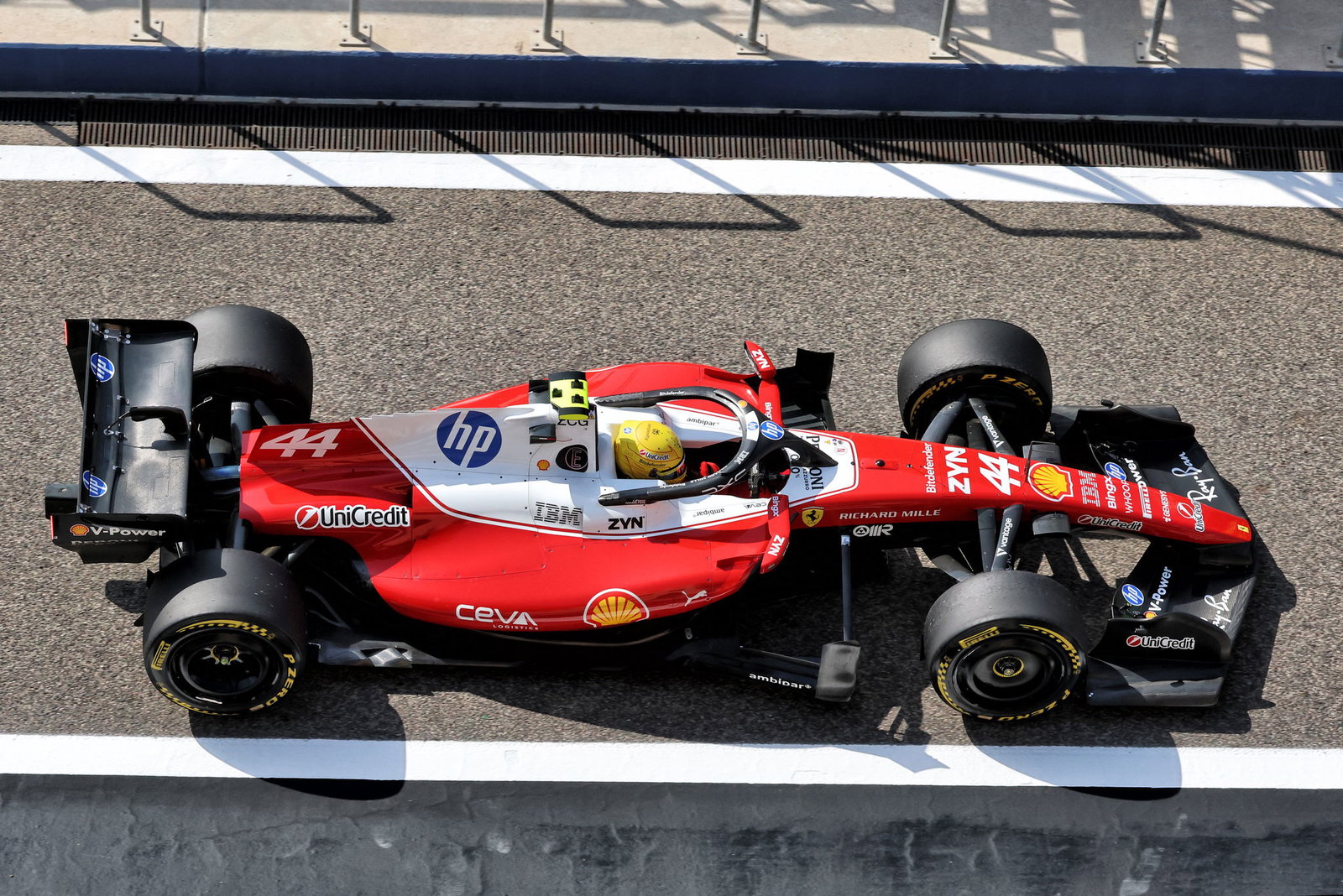 Lewis Hamilton Spots ‘Italian Bono’ Spark at Ferrari’s 2026 Comeback 3 Hamilton debriefs with Ferrari engineers during a 2026 race weekend