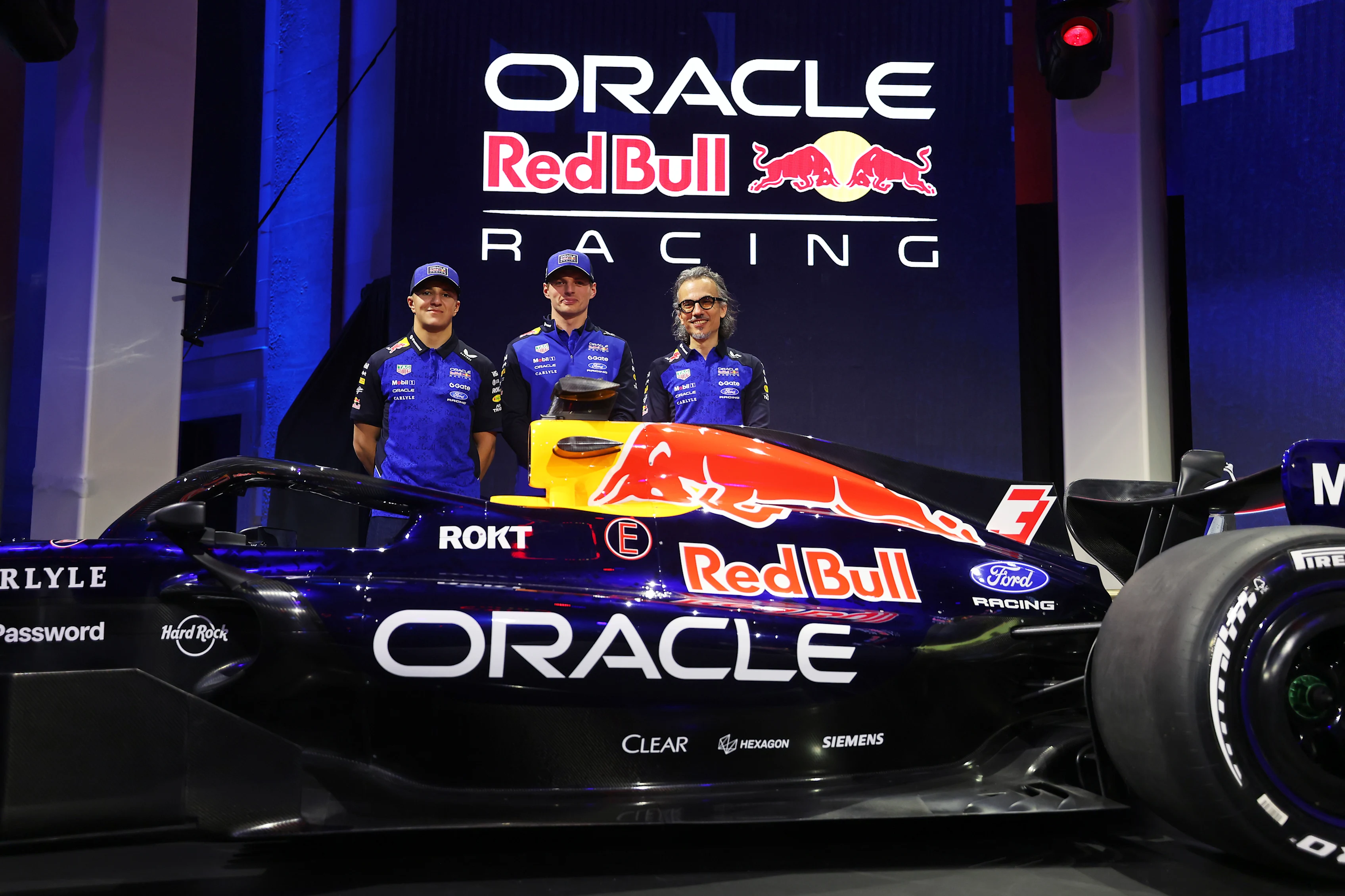 Key Reason Isack Hadjar Is Crucial to Max Verstappen and Red Bull 2 Isack Hadjar alongside Max Verstappen in the Red Bull garage during the 2026 season