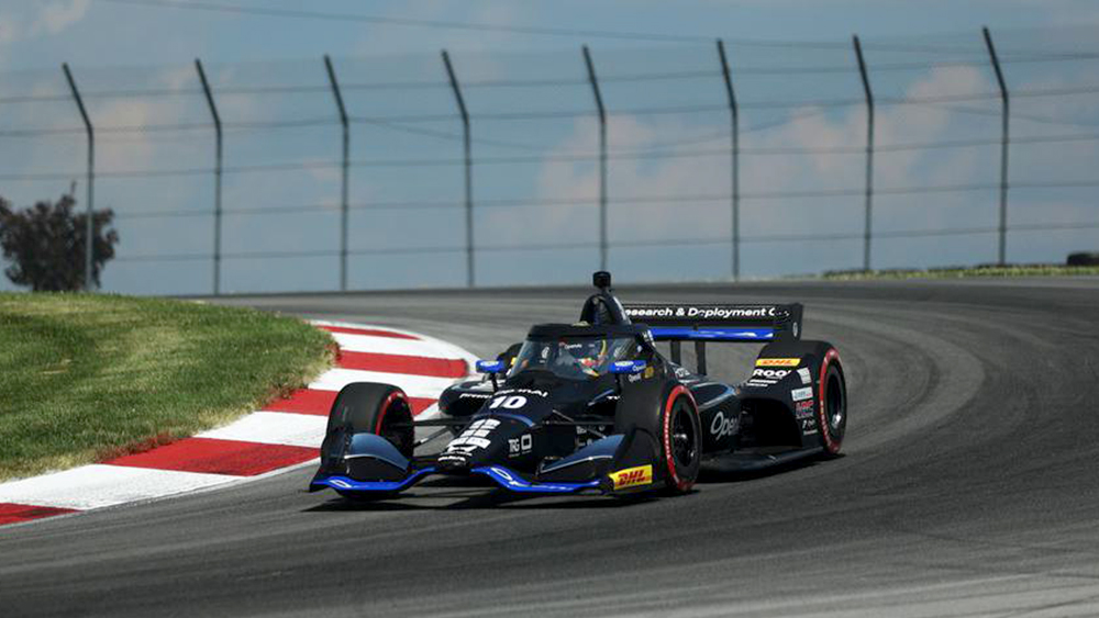 Alex Palou Dominates with Stunning Pole Lap in D.C. Race 3 Alex Palou attacking a braking zone during qualifying on the D.C. street circuit