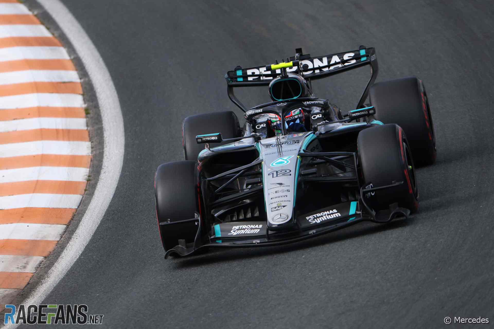 George Russell Reacts to Shocking Kimi Antonelli Pit Stop Call 2 Kimi Antonelli chases George Russell during the closing stages at Monza