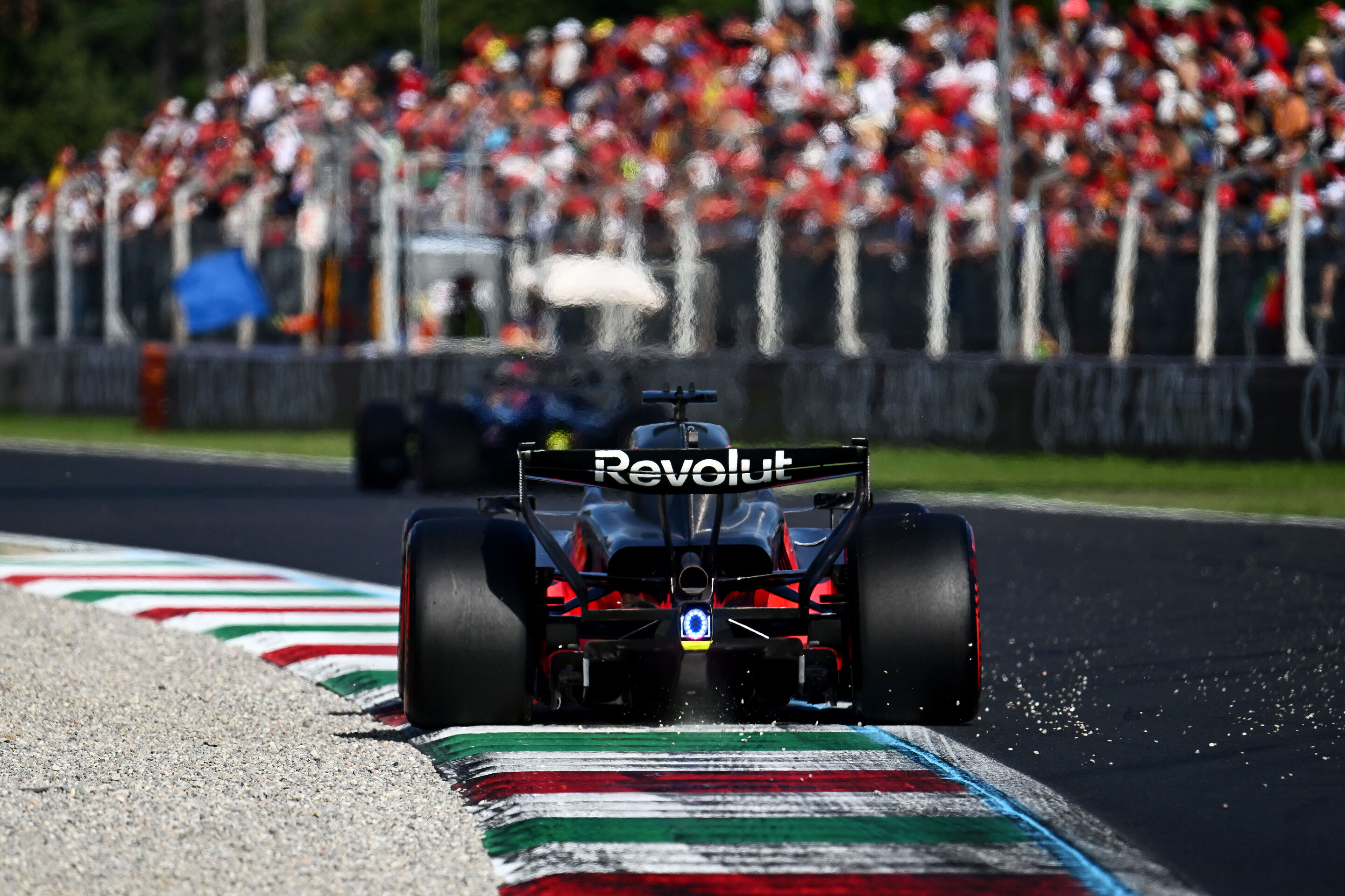 Audi Credits Red Bull for Incredible F1 Performance Turnaround 2 Audi pit crew executing a stop during the Italian Grand Prix