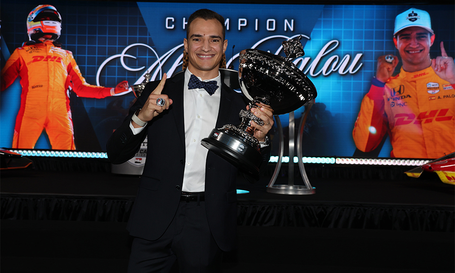 Alex Palou Celebrates Fifth Triumphant Victory Lap Crown 2 Alex Palou celebrates his fifth INDYCAR title during the Victory Lap ceremony