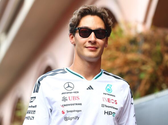 George Russell Spots High Pressure on Kimi Antonelli in Intense F1 Title Clash 2 George Russell celebrates a Grand Prix victory as Antonelli’s points lead narrows