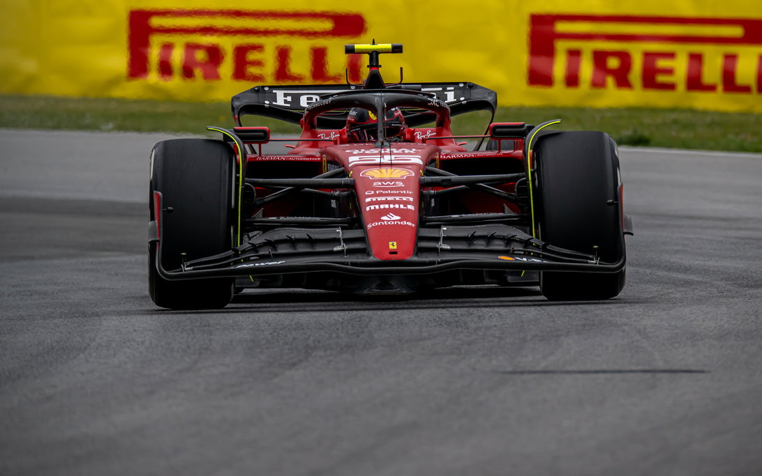 Charles Leclerc Reveals Ferrari’s Bold Aggression in Intense F1 Battle 3 Ferrari engineers working on rear wing updates