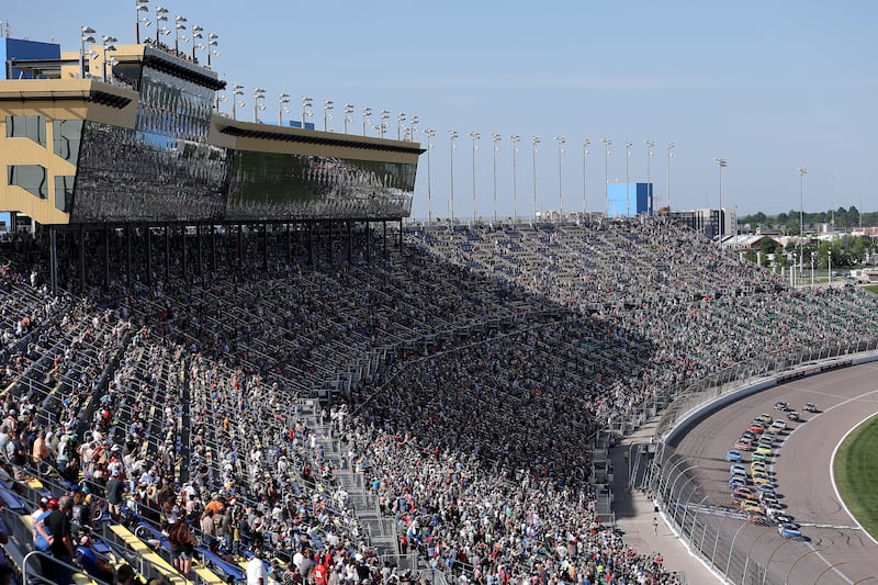 Kyle Larson Dominates Kansas NASCAR Cup with Record-Breaking Win 3 Larson's No. 5 car out front during the Kansas battle amid late-race pressure