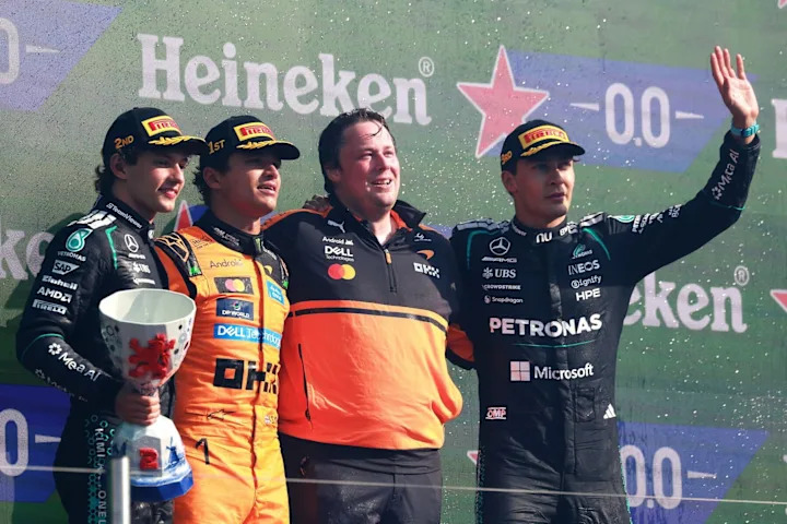 Norris Assesses His Bold Quest for a Victory Hat-Trick at Monza 3 Lando Norris celebrates victory as McLaren completes hat-trick