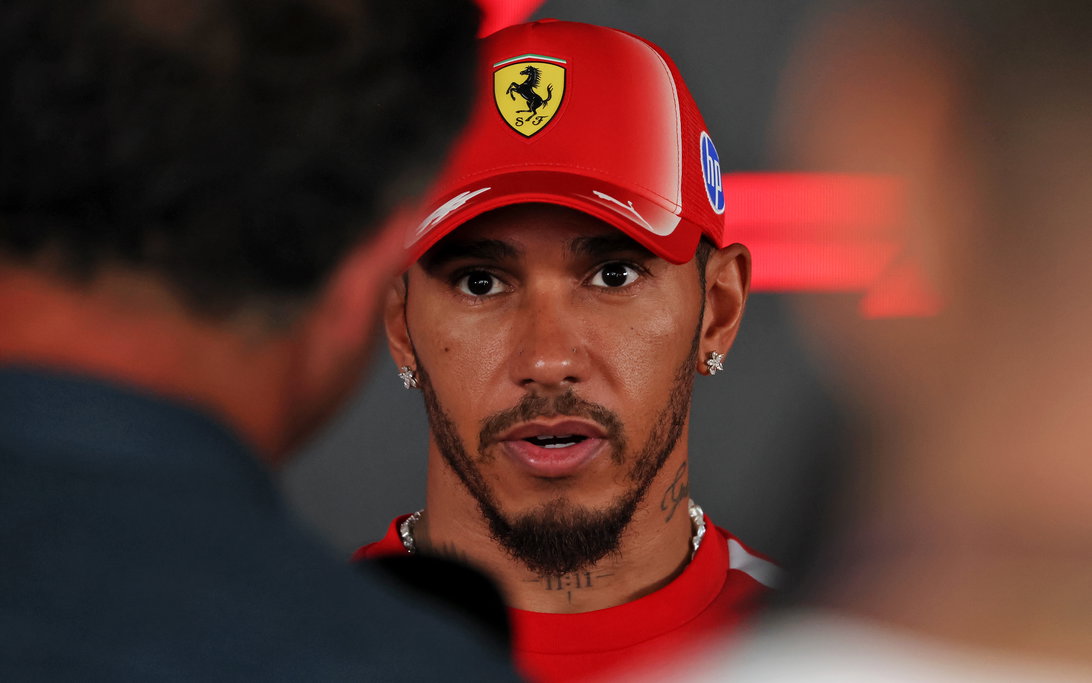 Lewis Hamilton Reveals Crucial Ferrari Grid Penalty Update 2 Lewis Hamilton during a Ferrari garage review amid power unit strategy discussions
