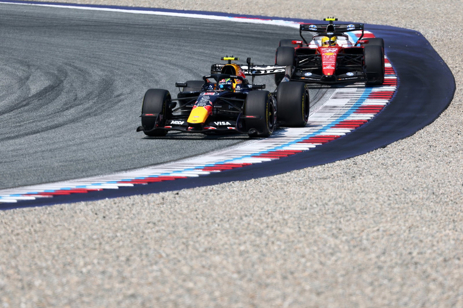 Red Bull Unveils Key Upgrade Details for Max Verstappen and Isack Hadjar 3 Red Bull mechanics prepare the upgraded RB22 package during Baku weekend