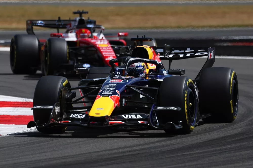 Ferrari Reveal Bold Insight Amid Impressive F1 Comeback 2 Ferrari and Red Bull rear-wing detail under scrutiny during an F1 weekend