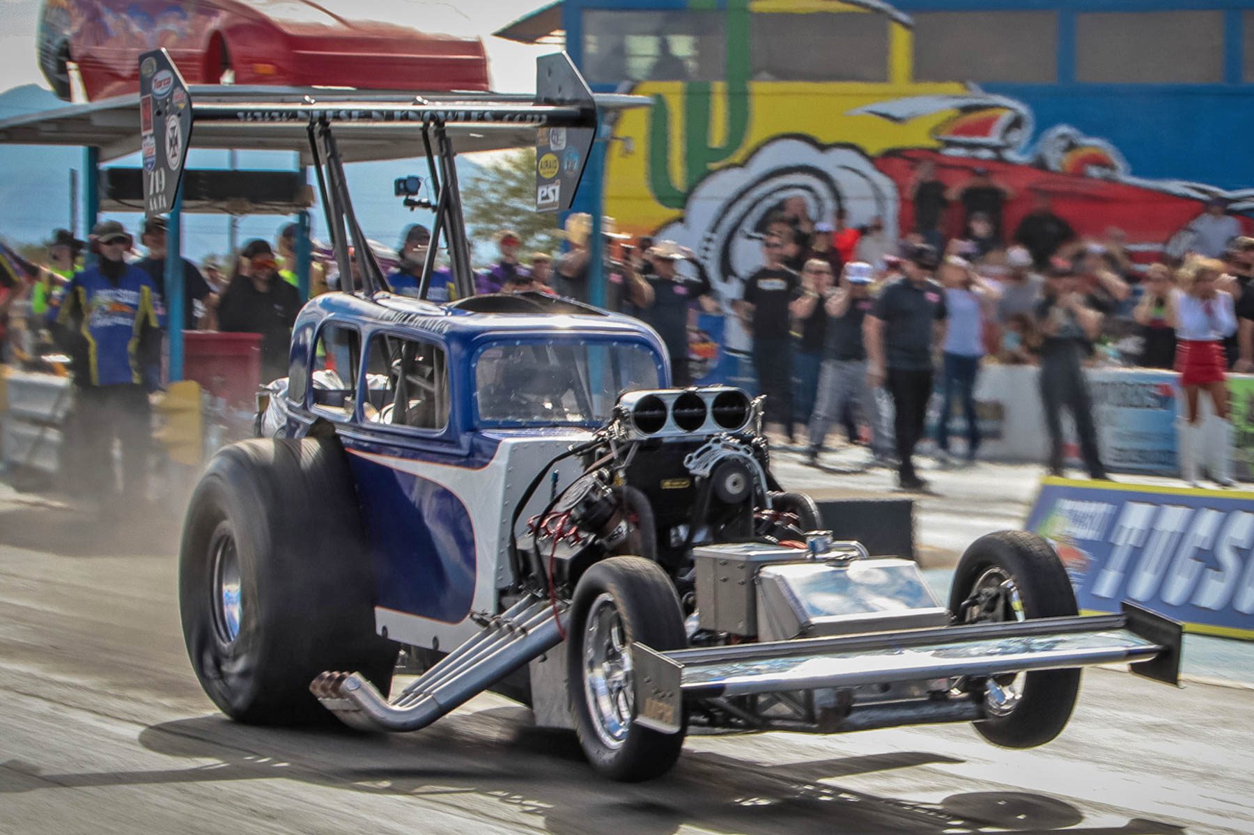 Fuel Altered CHAOS Gears Up to Dominate Tucson Dragway 2 Fuel Altered CHAOS cars launch at night in Tucson with header flames