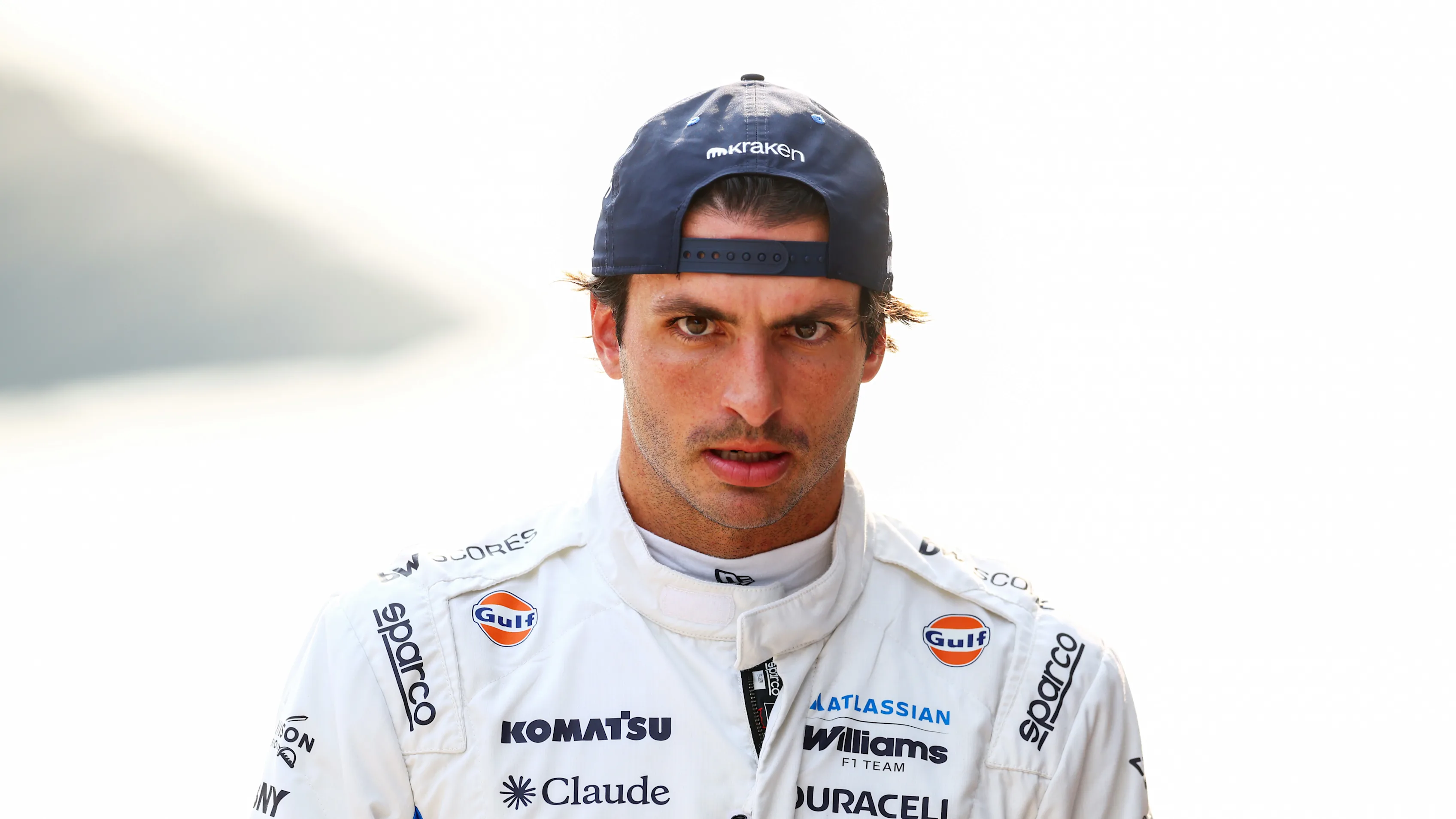 How a Shocking Fight for P6 in Malaysia Completely Collapsed 2 Midfield cars navigating mixed conditions early in the race at Sepang
