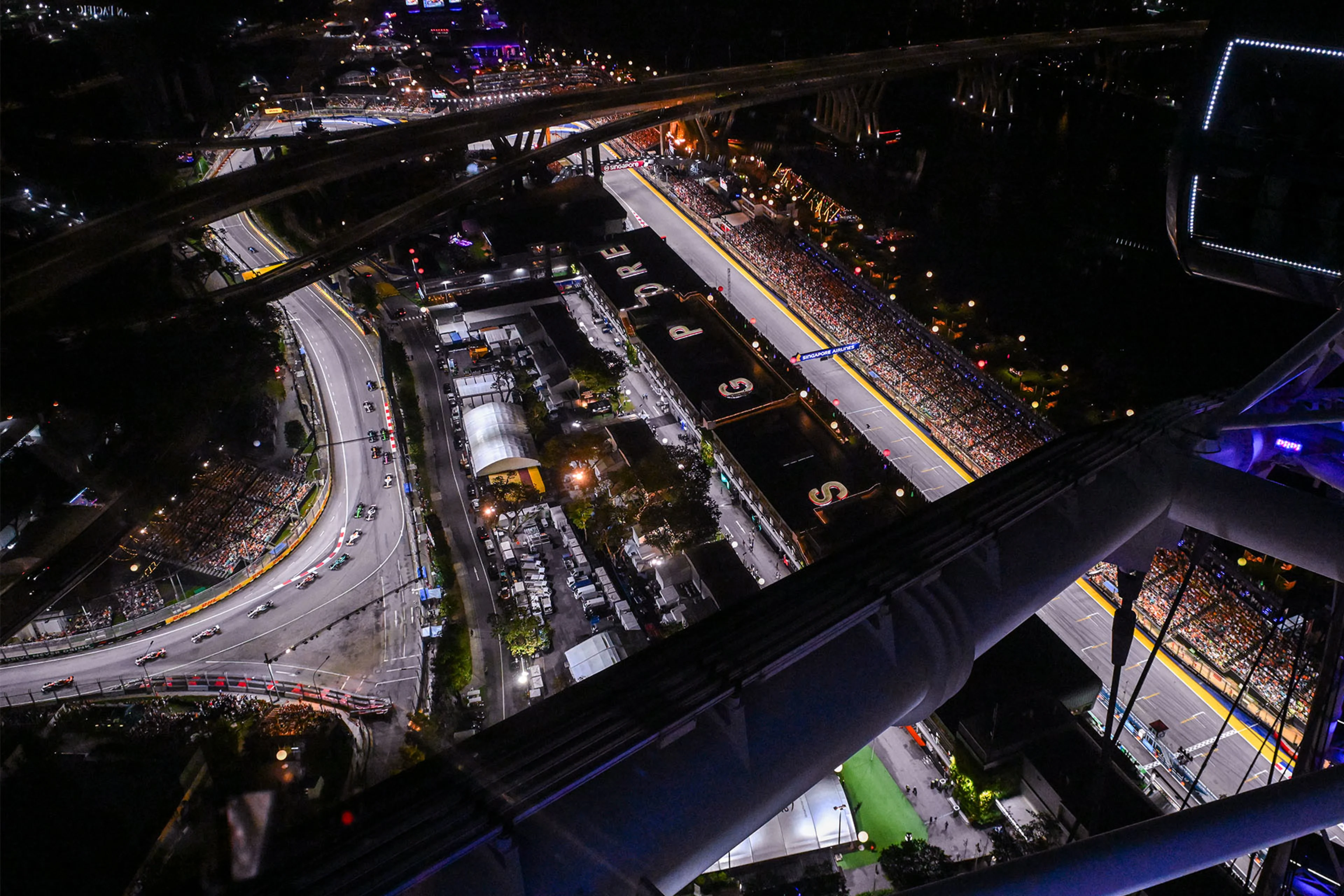 2026 F1 Singapore Grand Prix Marina Bay Sprint Weekend Schedule Revealed 3 McLaren car under Singapore night lights during the 2026 Grand Prix weekend
