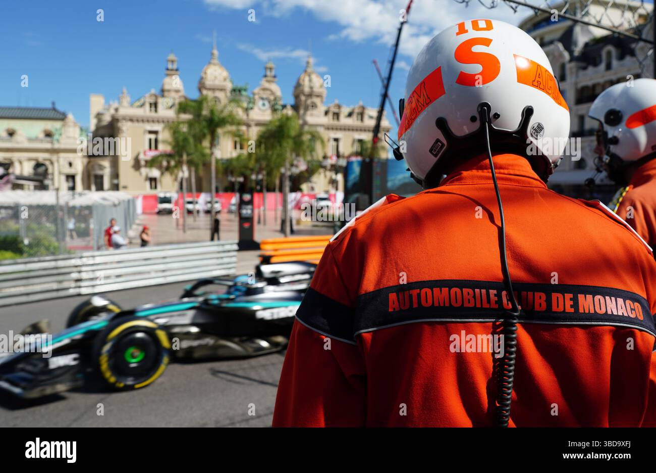 Live Updates: Second Practice Session Kicks Off in the United States 1 track marshals watch mercedes george russell drive past during Live Updates: Second Practice Session Kicks Off in the United States