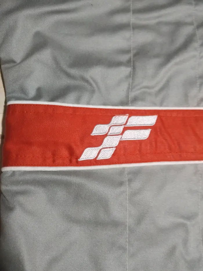Embroidered FervoGear logo on a red waist band Embroidered FervoGear logo on a red waist band