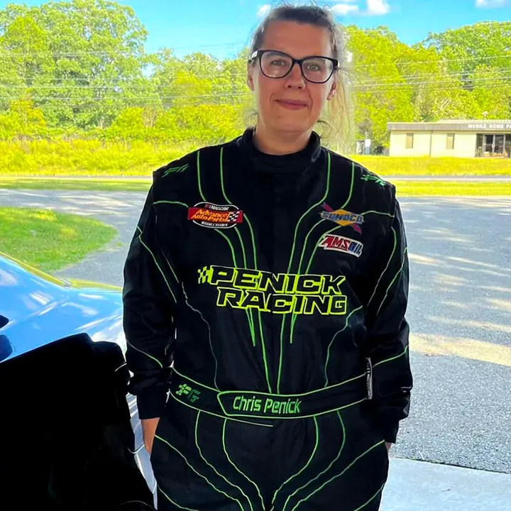 Chris Penick in a black and green Penick Racing suit Chris Penick in a black and green Penick Racing suit