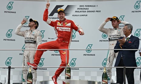 Sebastian Vettel celebrates Malaysian Grand Prix victory